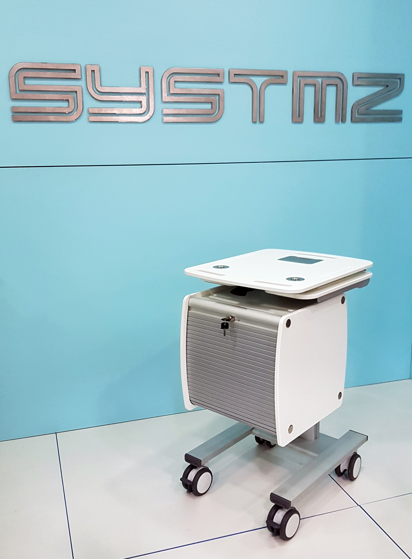 A versatile powered mobile workspace that doubles as a rigid powerstation and storage area due to it's sliding tambour door feature ergotron, sv40, sv41, sv42, sv-40, sv-41, sv-42, humanscale, cow, wow, bmw