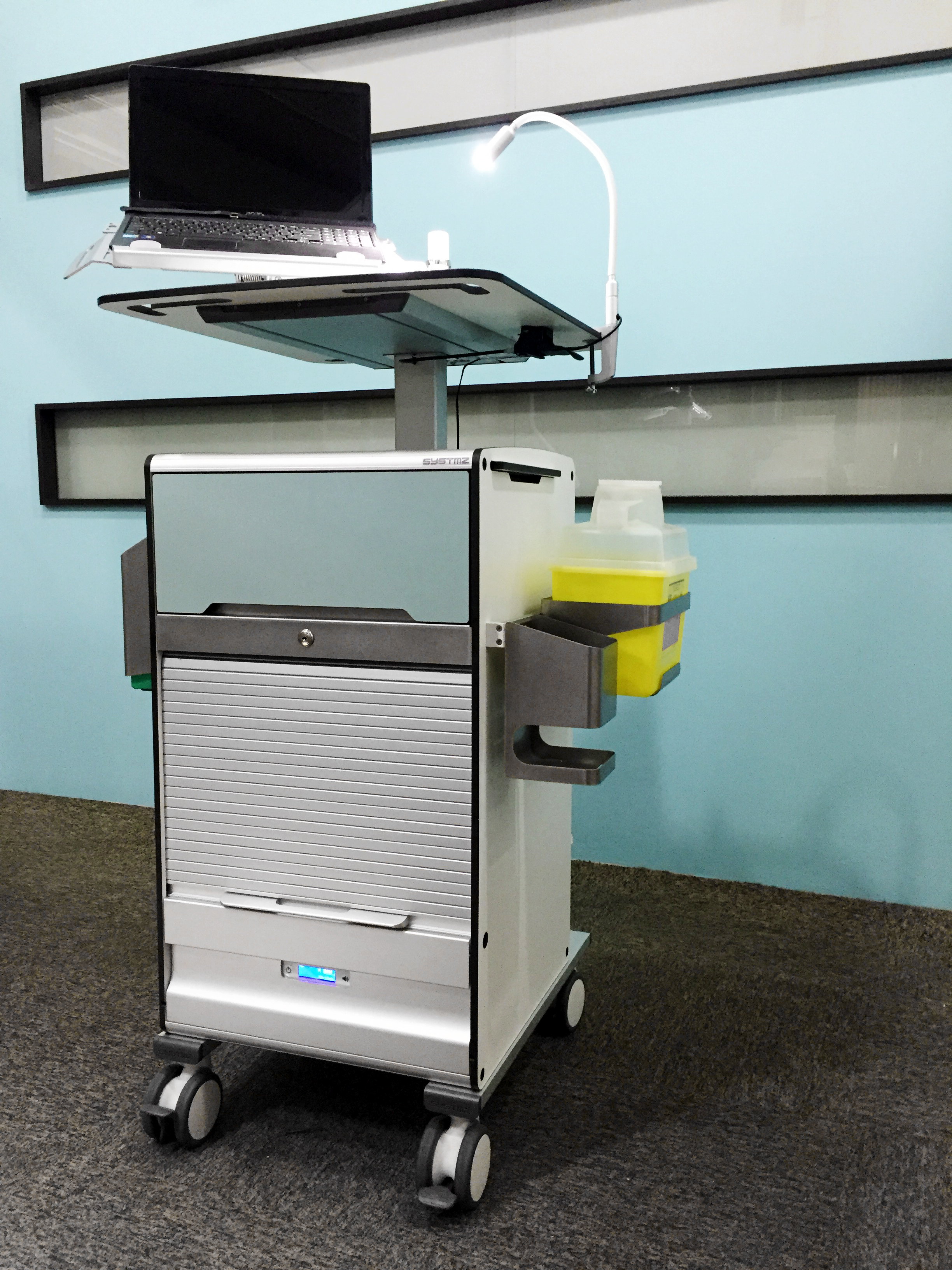 Sharpbox and hand sanitiser holding feature for healthcare frontliner operations like ergotron and humanscale