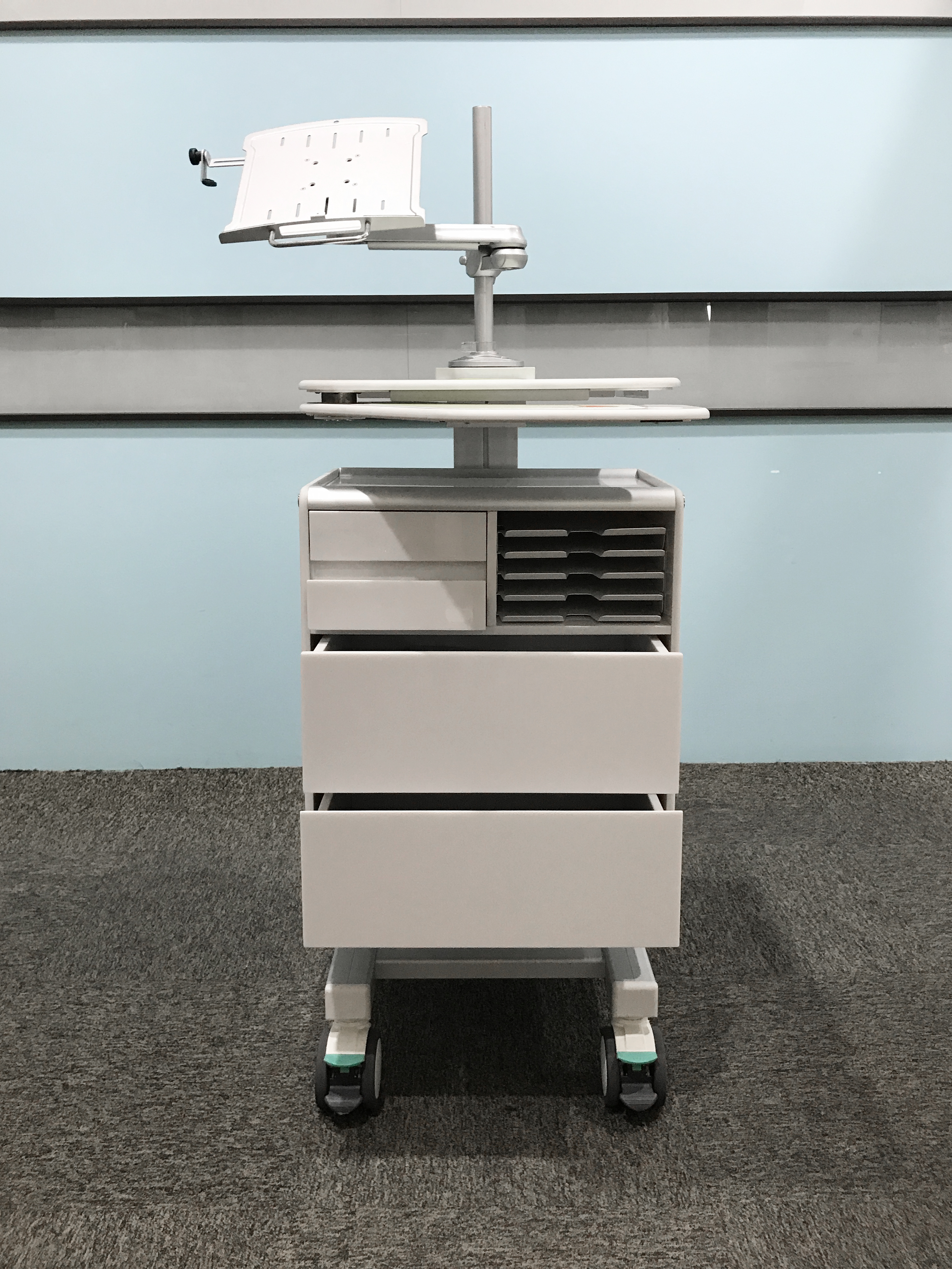 A mobile workstation specifically designed for administrative support ergotron, sv40, sv41, sv42, sv-40, sv-41, sv-42, humanscale, cow, wow, bmw